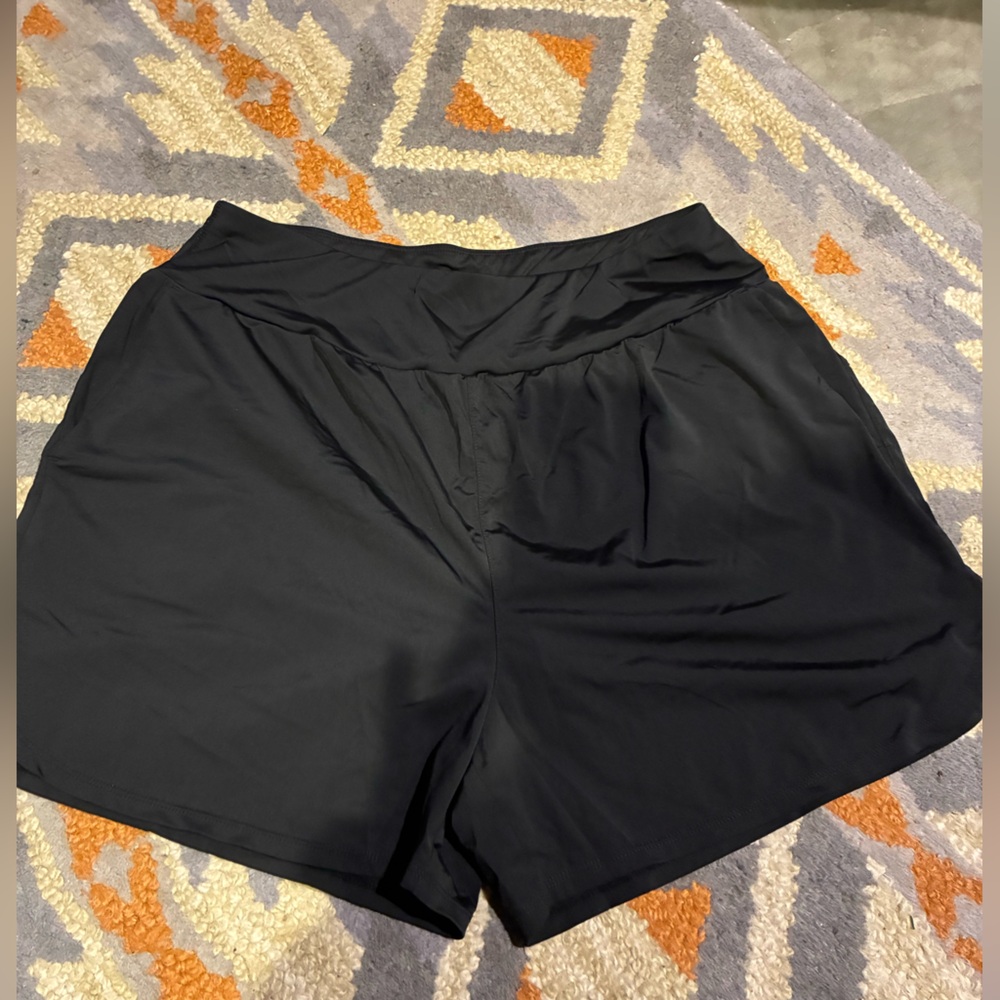 Black athletic running shorts. Size large